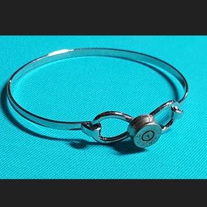 Silver infinity sign bullet casing bangle
